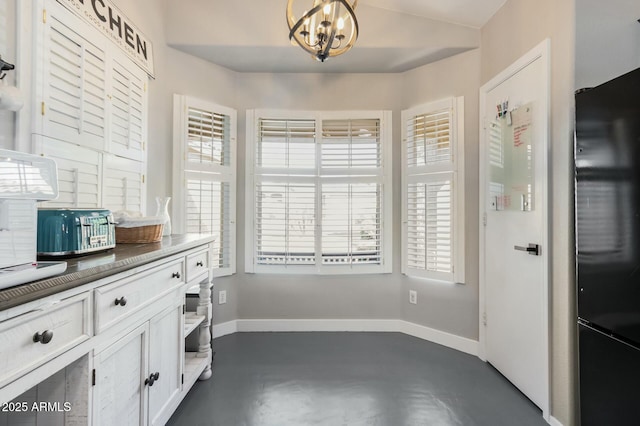 interior space with a chandelier