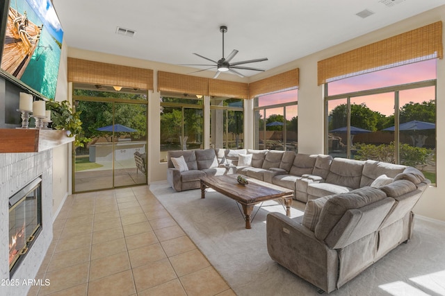 3410 E Inglewood Cir, Mesa, AZ 85213 - tiled living area with visible vents, ceiling fan, and a fireplace