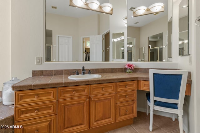 3410 E Inglewood Cir, Mesa, AZ 85213 - bathroom featuring vanity, tile patterned floors, visible vents, and a shower stall