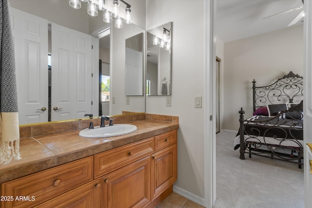3410 E Inglewood Cir, Mesa, AZ 85213 - bathroom with baseboards, ceiling fan, and vanity