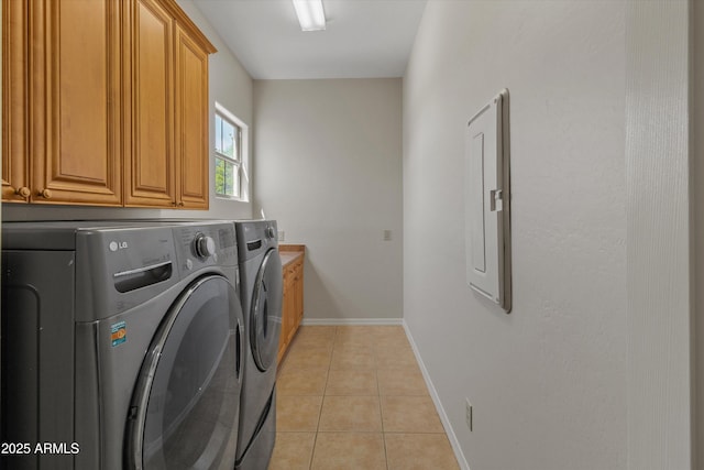 3410 E Inglewood Cir, Mesa, AZ 85213 - washroom featuring cabinet space, light tile patterned floors, baseboards, and washer and clothes dryer