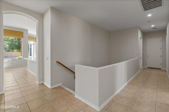 3410 E Inglewood Cir, Mesa, AZ 85213 - corridor with visible vents, recessed lighting, light tile patterned flooring, and an upstairs landing