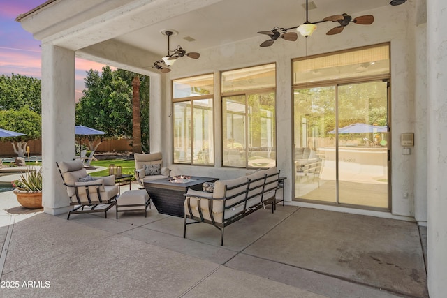 3410 E Inglewood Cir, Mesa, AZ 85213 - view of patio / terrace with ceiling fan, fence, and an outdoor living space with a fire pit