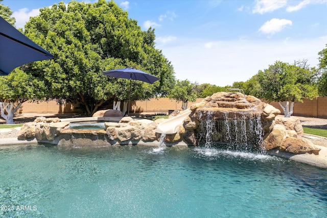 3410 E Inglewood Cir, Mesa, AZ 85213 - view of pool with an in ground hot tub and fence