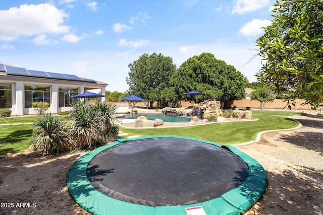 3410 E Inglewood Cir, Mesa, AZ 85213 - view of yard with an outdoor pool and a trampoline