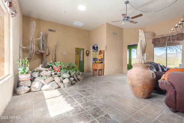 interior space featuring ceiling fan