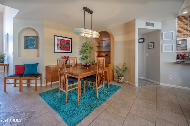 dining room with light tile patterned floors