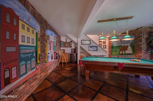 game room with beamed ceiling, billiards, and brick wall