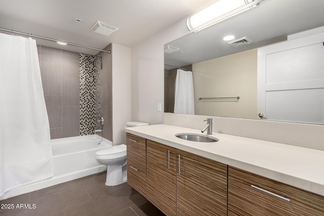 full bathroom with tile patterned flooring, vanity, shower / bath combination with curtain, and toilet