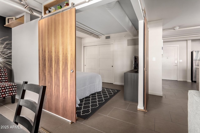 bathroom featuring tile patterned flooring