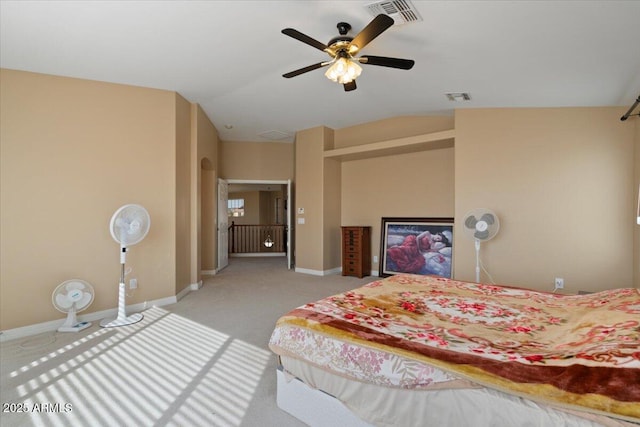 carpeted bedroom featuring vaulted ceiling and ceiling fan