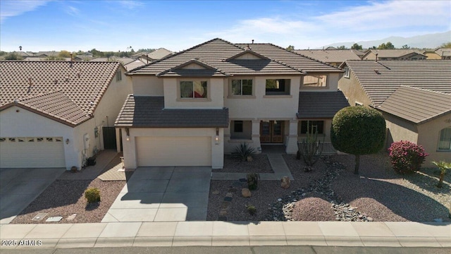 view of front of property featuring a garage