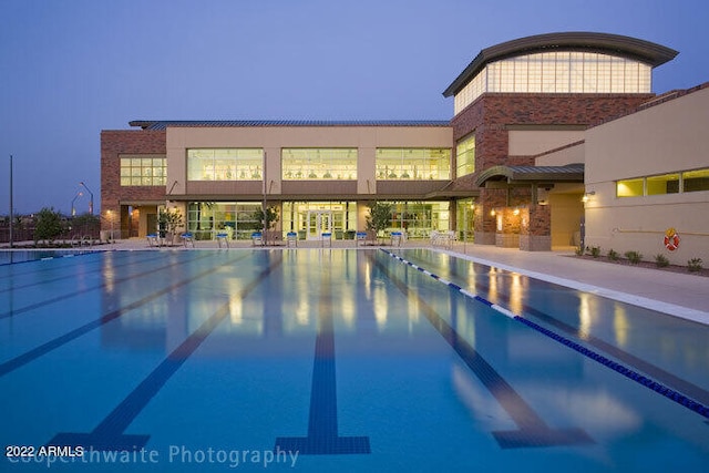 pool with a patio area