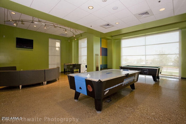 rec room with a paneled ceiling, pool table, visible vents, track lighting, and speckled floor