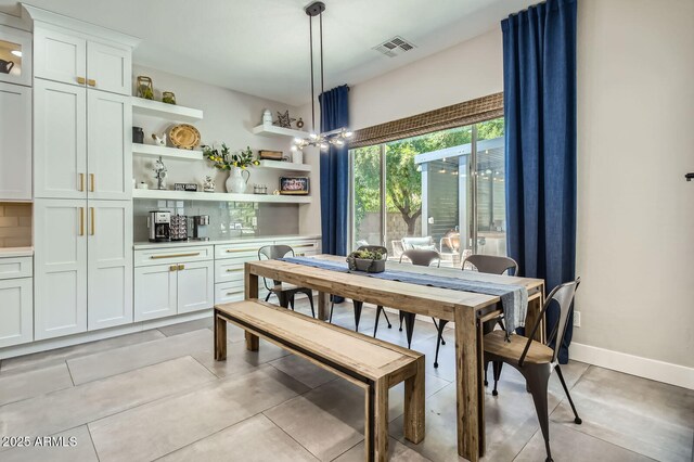 1890 E Sagittarius Pl, Chandler, AZ 85249 - dining area featuring light tile patterned floors and baseboards