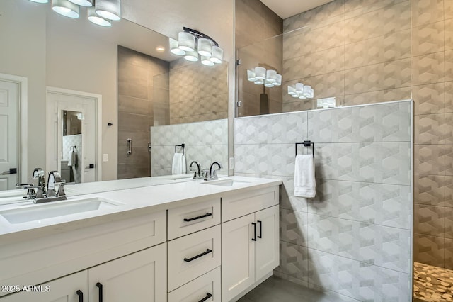 1890 E Sagittarius Pl, Chandler, AZ 85249 - bathroom featuring tile walls, walk in shower, and double vanity