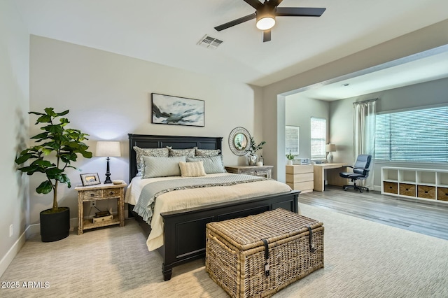 1890 E Sagittarius Pl, Chandler, AZ 85249 - bedroom featuring baseboards, ceiling fan, and light wood-style floors