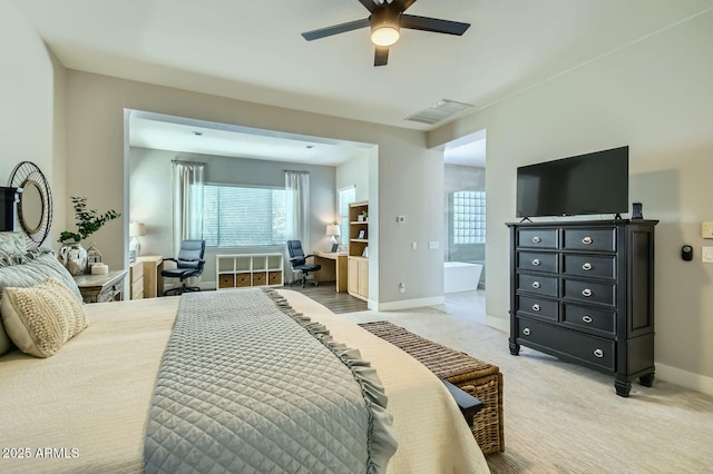 1890 E Sagittarius Pl, Chandler, AZ 85249 - bedroom with baseboards, light carpet, ceiling fan, and an office area