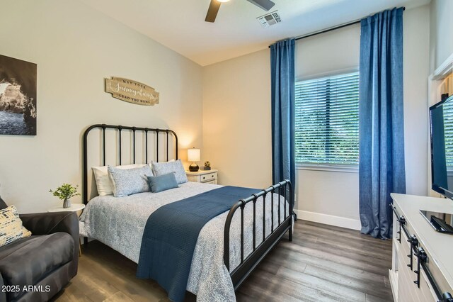 1890 E Sagittarius Pl, Chandler, AZ 85249 - bedroom featuring dark wood-type flooring, baseboards, and ceiling fan