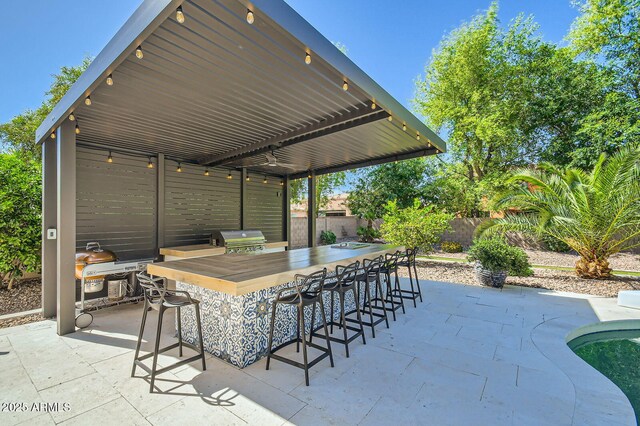 1890 E Sagittarius Pl, Chandler, AZ 85249 - view of patio featuring a grill and fence