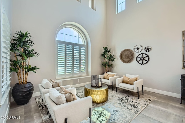 1890 E Sagittarius Pl, Chandler, AZ 85249 - living area with a towering ceiling and baseboards