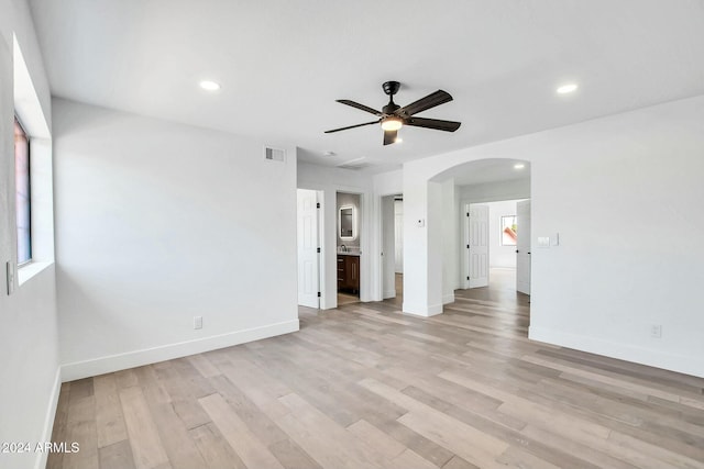 unfurnished room featuring ceiling fan and light hardwood / wood-style flooring