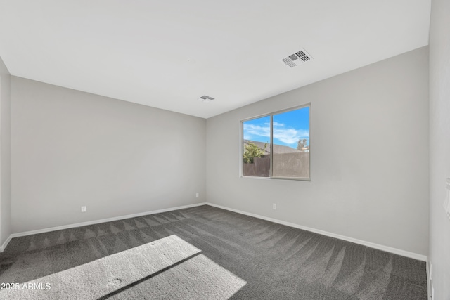 8944 N 180th Dr, Waddell, AZ 85355 - spare room featuring carpet flooring, baseboards, and visible vents