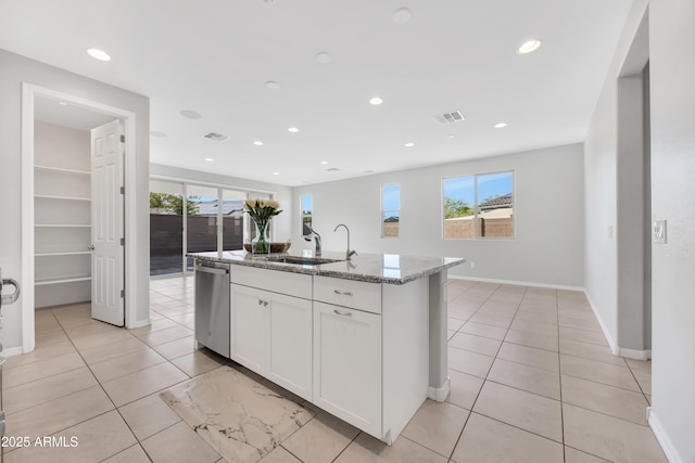 8944 N 180th Dr, Waddell, AZ 85355 - kitchen featuring stainless steel dishwasher, plenty of natural light, visible vents, and a sink