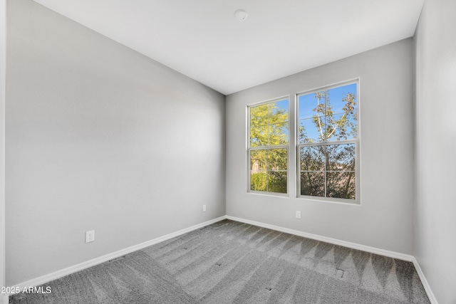 8944 N 180th Dr, Waddell, AZ 85355 - carpeted spare room featuring baseboards