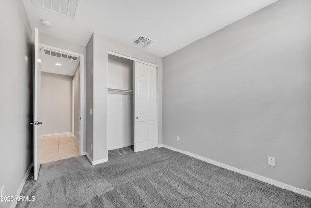 8944 N 180th Dr, Waddell, AZ 85355 - unfurnished bedroom featuring visible vents, baseboards, and carpet floors