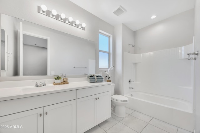 8944 N 180th Dr, Waddell, AZ 85355 - bathroom featuring vanity, tile patterned floors, toilet, shower / bathtub combination, and visible vents