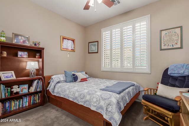 carpeted bedroom with ceiling fan