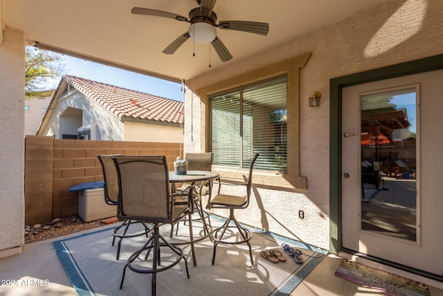 view of patio / terrace featuring ceiling fan