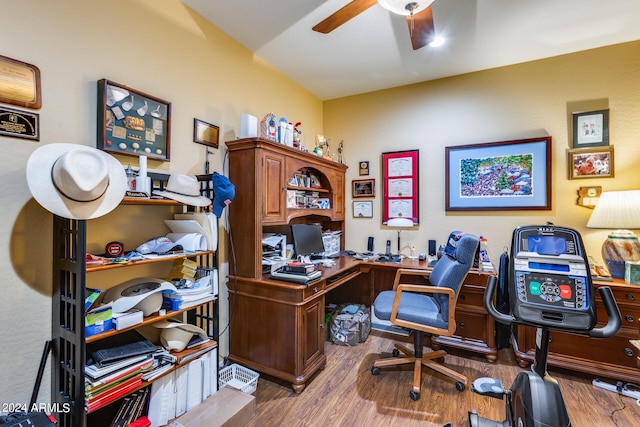 home office featuring hardwood / wood-style flooring and ceiling fan