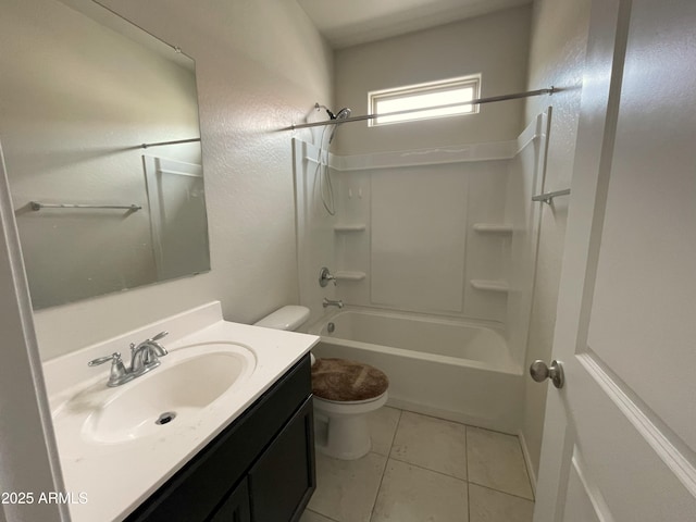 bathroom with toilet, vanity, tile patterned floors, and shower / bathing tub combination