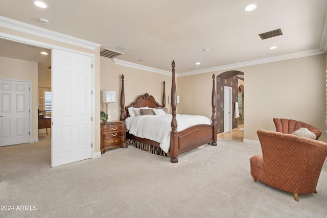 carpeted bedroom featuring ornamental molding