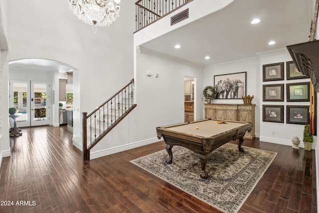 recreation room with french doors, dark hardwood / wood-style flooring, ornamental molding, and billiards