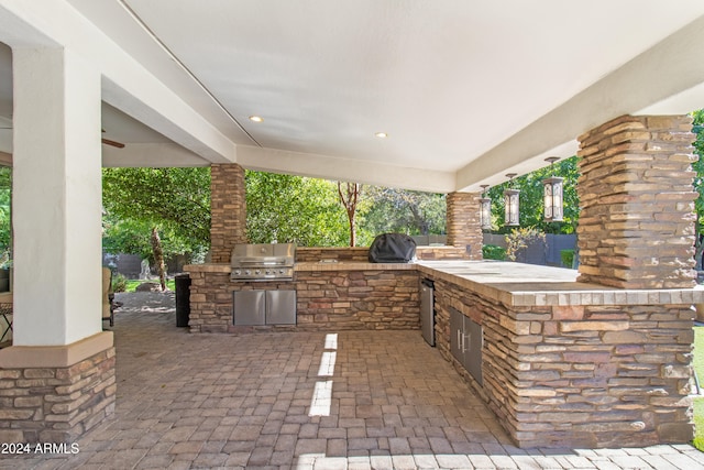 view of patio / terrace featuring ceiling fan and area for grilling