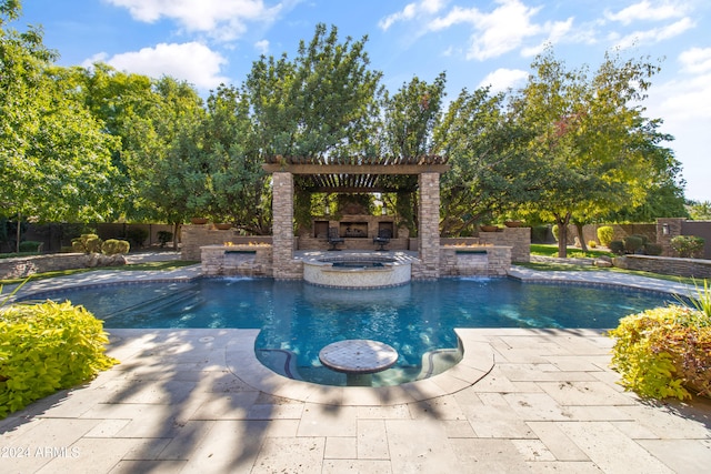 view of pool featuring an in ground hot tub and a patio area