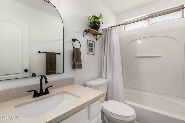 full bathroom featuring vanity, toilet, and shower / bath combo