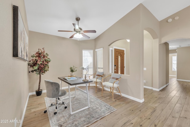 office area with ceiling fan and light hardwood / wood-style floors