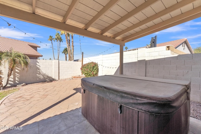 view of patio with a hot tub