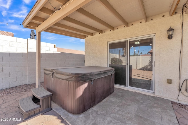 view of patio / terrace featuring a hot tub