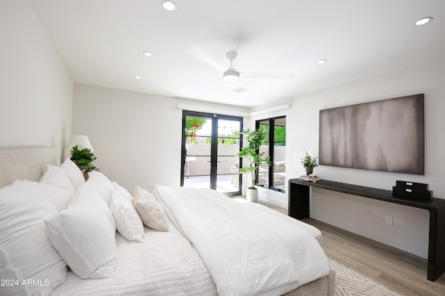 bedroom featuring ceiling fan, access to exterior, french doors, and light hardwood / wood-style flooring