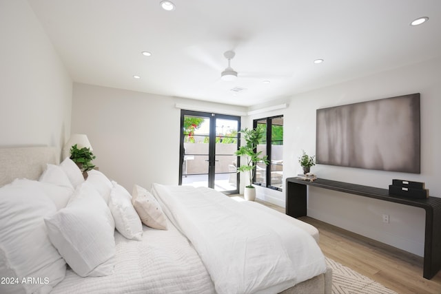 bedroom with ceiling fan, access to exterior, french doors, and light hardwood / wood-style flooring