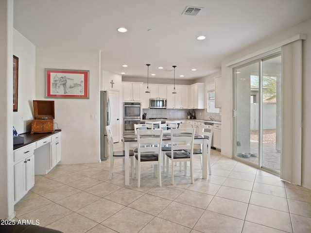 view of tiled dining area