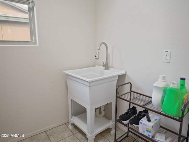 bathroom with tile patterned flooring