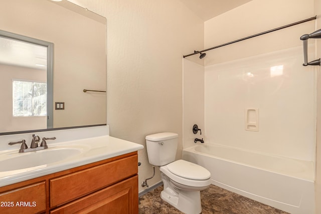 full bathroom with  shower combination, vanity, and toilet