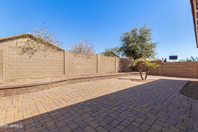 view of patio with a fenced backyard