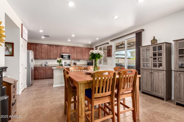 13123 W Cottontail Ln, Peoria, AZ 85383 - dining room with recessed lighting and light tile patterned flooring